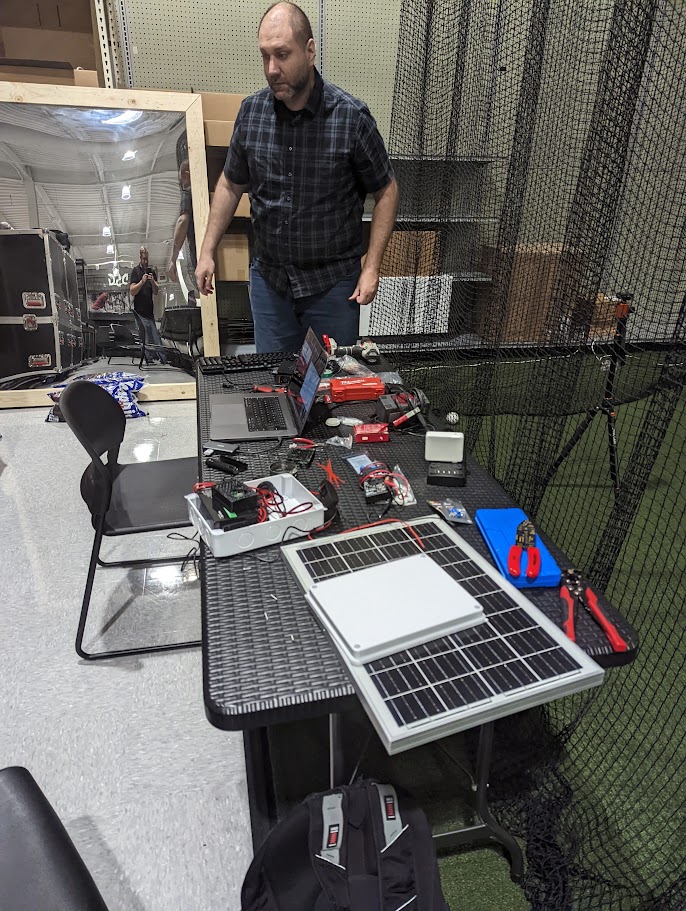 Solar-powered prototype hardware laid out on a table
